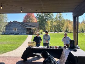 Participants gathered beside the raffle prizes at the 2026 WCAMPWA Sporting Clays Fundraising event